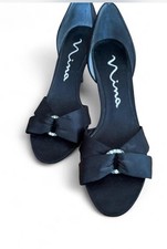 Nina black satin d'Orsay heels with a rhinestone bow accent.  black satin