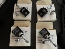 Brand New Set of Four (4) OEM Genuine BMW TPMS 36-10-6-887-147