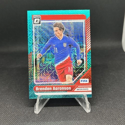 2024-25 Panini Donruss Optic FIFA Brenden Aaronson Teal Mojo Prizm /49 #11 US