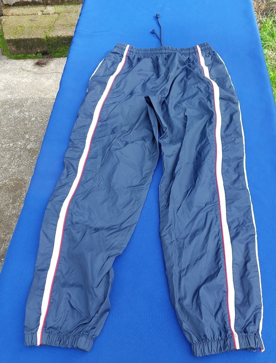 トラックパンツ・ジャージ [FILA] Heritage Linear Tape Track Pants FS2FPC1120XINA Fila® Logo Track Pants - Relaxed Fit, Black | King Size