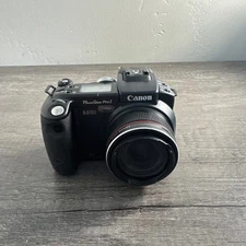 Canon PowerShot Pro 1 PC1057 8.0mp 7x Optical Zoom Digital Camera NO BATTERY