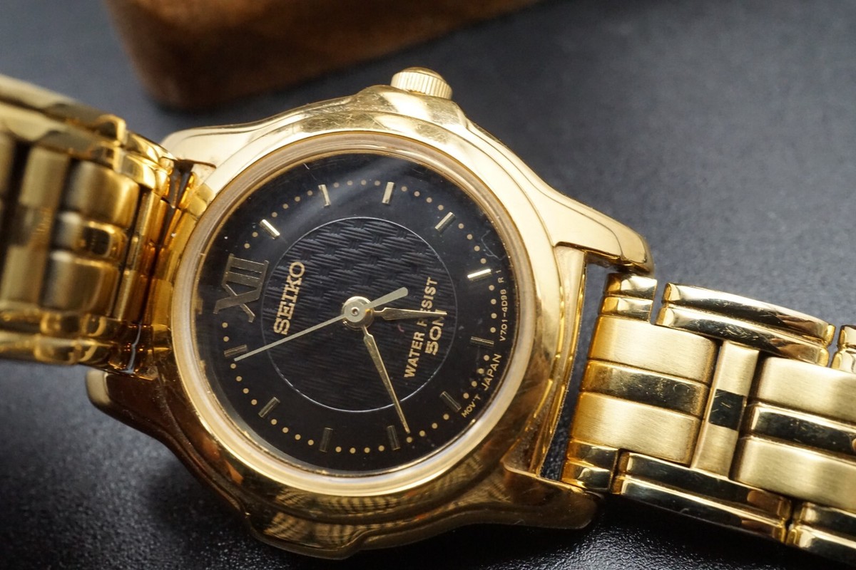 MINT Ladies Seiko V701-2J10 Gold Tone Black Dial Quartz Watch