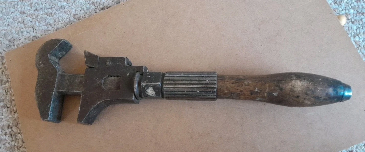VINTAGE TOWER AND LYONS ADJUSTABLE WRENCH?
