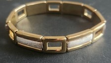 Gold/Silver Tone Stretchable Bracelet.  2.5 in stretches to 4.5. Some wear.