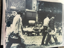 CHUCK BEDNARIK PHILADELPHIA EAGLES UNSIGNED 8X10 FRANK GIFFORD ON STRETCHER