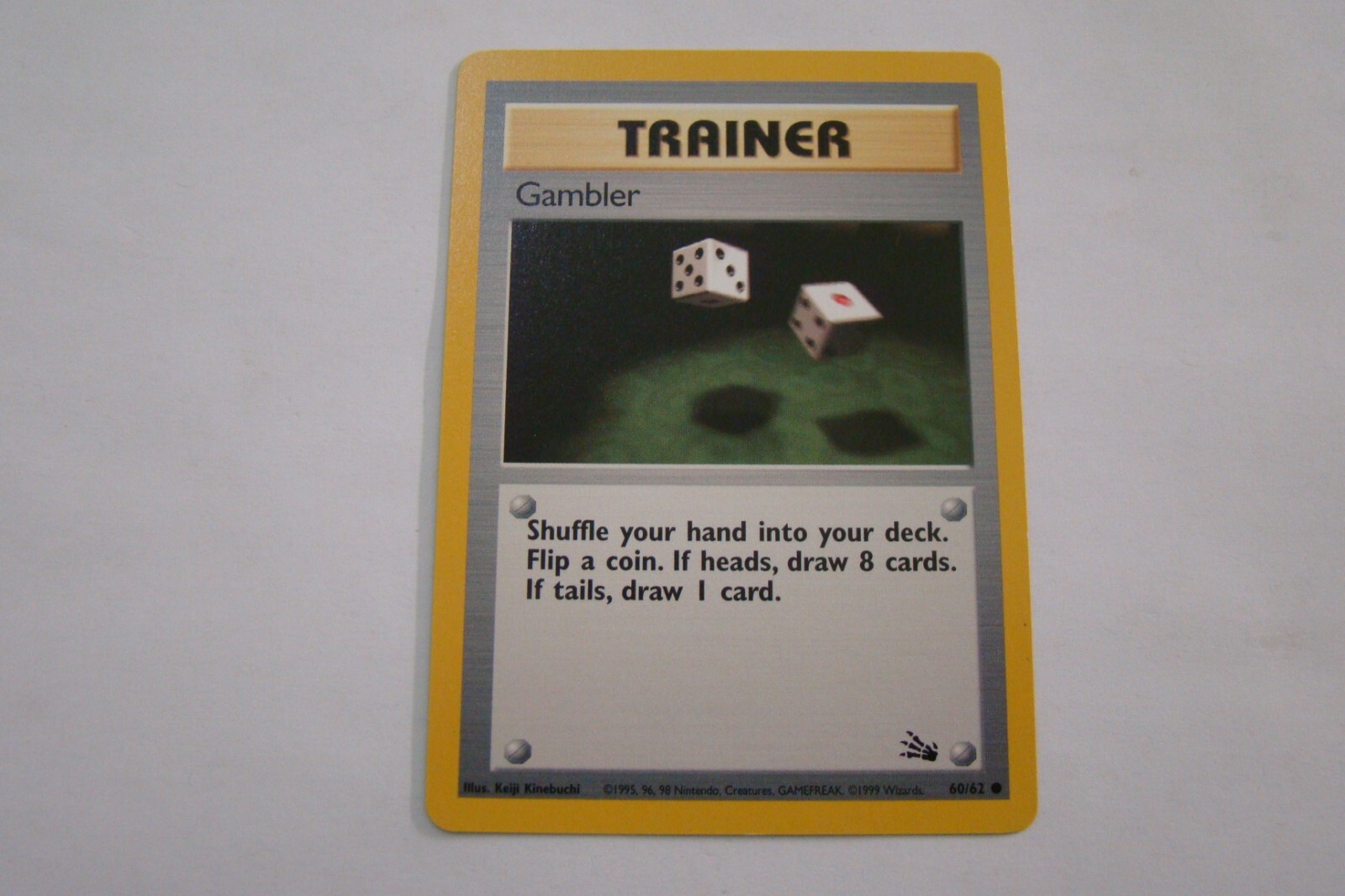 Pokemon TCG Fossil Trainer Gambler 60/62 Common NM