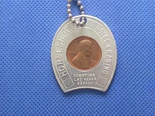 HORSESHOE HOTEL & CASINO Encased Coin 1970 Penny Horseshoe Shaped Keychain