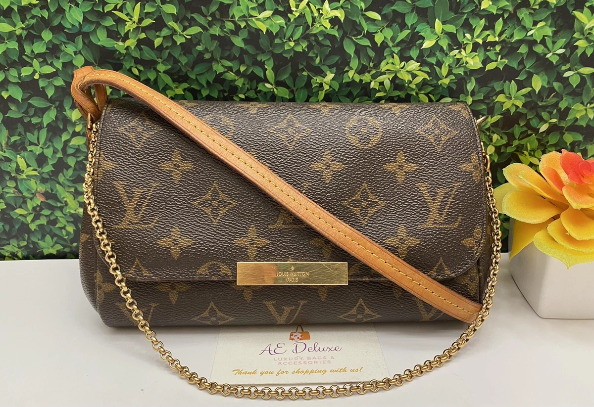 louis vuitton clutch with chain