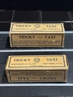 2 VINTAGE ORIGINAL MARX WIND UP TRICKY TAXI EARLY BOXES