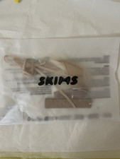 SKIMS FAUX HAIR MICRO STRING THONG  CLAY BLONDE STRAIGHT SIZE M 