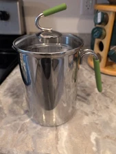 Kuhn Rikon  4th Burner 18/10. Stainless Steel. Green Handle.