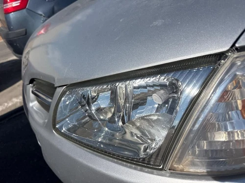 Faro Izquierdo para NISSAN ALMERA (N16/E) Acenta 2001 1128554