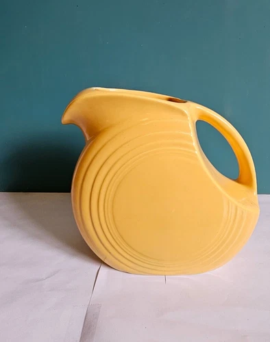 Yellow Fiesta Ware Ceramic Disk Pitcher 6 inch Tall