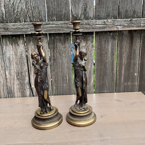 large set of brass/bronzed vintage beautiful ladies statues.Clock side ornaments