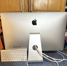 Apple Thunderbolt Display monitor 27in. Never used, and comes with keyboard.