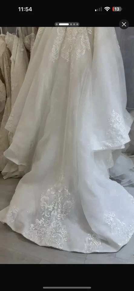 Vestido de novia desmontable sobrefalda desmontable sobre falda tren desmontable Foto 2 de 4