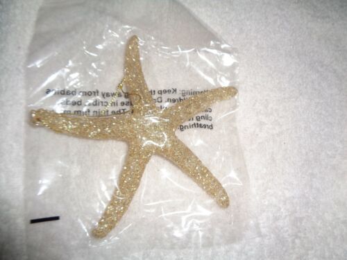 Ornamento pesce stella oro - Foto 1 di 1