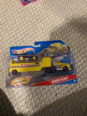 Hot Wheels Speed Team - Car plus Transport Rig - Purple & Yellow W4671