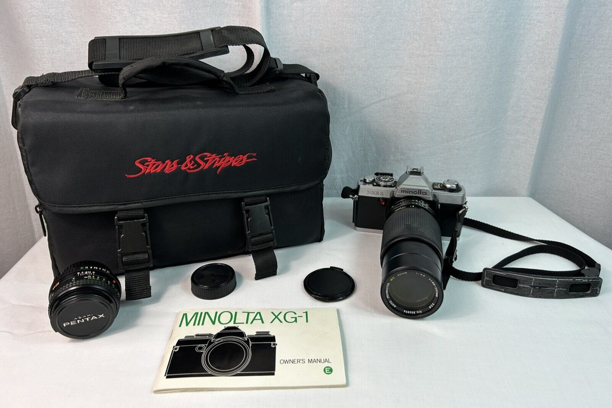 Minolta XG-1 35mm SLR Film Camera w/ Carrying Case + 205MM & 50MM