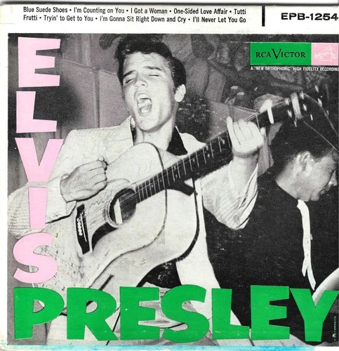 Lot of Twenty Two Elvis Presley 45s and eps with picture covers