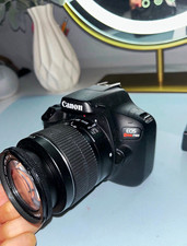 Canon EOS Rebel T100 18MP DSLR w/ EF-S 18-55mm Lens, Battery  Charger