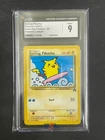 Surfing Pikachu 2001 Pokemon CGC 9 Black Star Promo Pokemon League #28