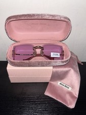 Miu Miu MU A51S Rimless Shield Sunglasses Pale Gold Frame Pink Purple Lens