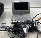 Polaroid PDV-0707N 7" Portable DVD Player In Bag With Accessories — photo 1