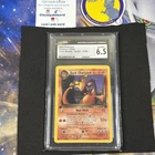 CGC 6.5 - Dark Charizard 21/82 Team Rocket 1st Edition Pokemon Card. NON-Holo