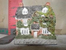 MALCOM COOPER ENGLISH COTTAGE FIGURINE - 1987, UNREADABLE LABEL FOR BUIDING NAME
