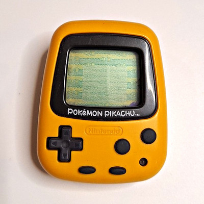 Nintendo Pokémon Pikachu Handheld LCD Virtual Pet Tamagotchi gelb 1999 D-63760