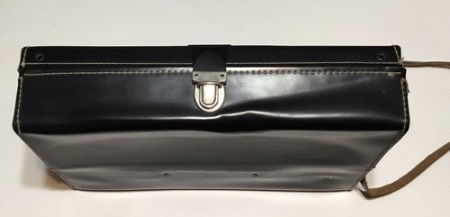 Black vintage leather shoulder bag with silver clasp and strap, made in USA by Diamond, on white background.