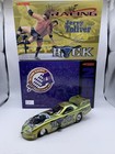 NIB Jerry Toliver WWF The ROCK2000 Camaro Funny Car NHRA Action 124 Diecast