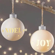 SET OF 2 CERAMIC LED LIGHTED CUT-OUT NOEL and JOY CHRISTMAS TREE ORNAMENTS.