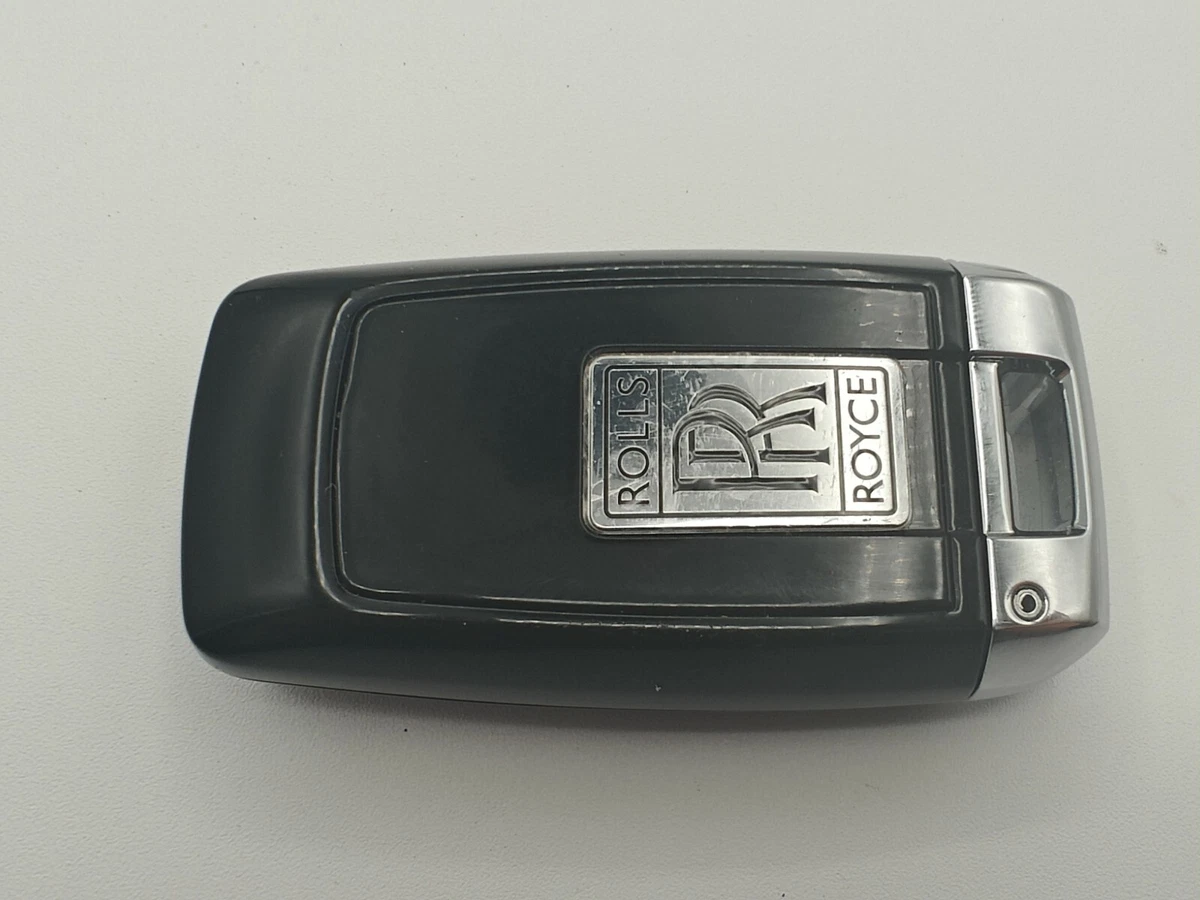 The New Rolls Royce Cullinan Wireless Keys in Male Hand Interior with  Natural Wood Panel Editorial Stock Image  Image of driver handle  140770144