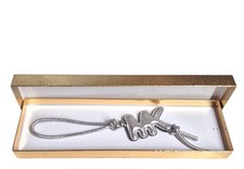 Michael Kors Puffy Logo Metallic Leather Bag Charm Keychain Silver New with Box
