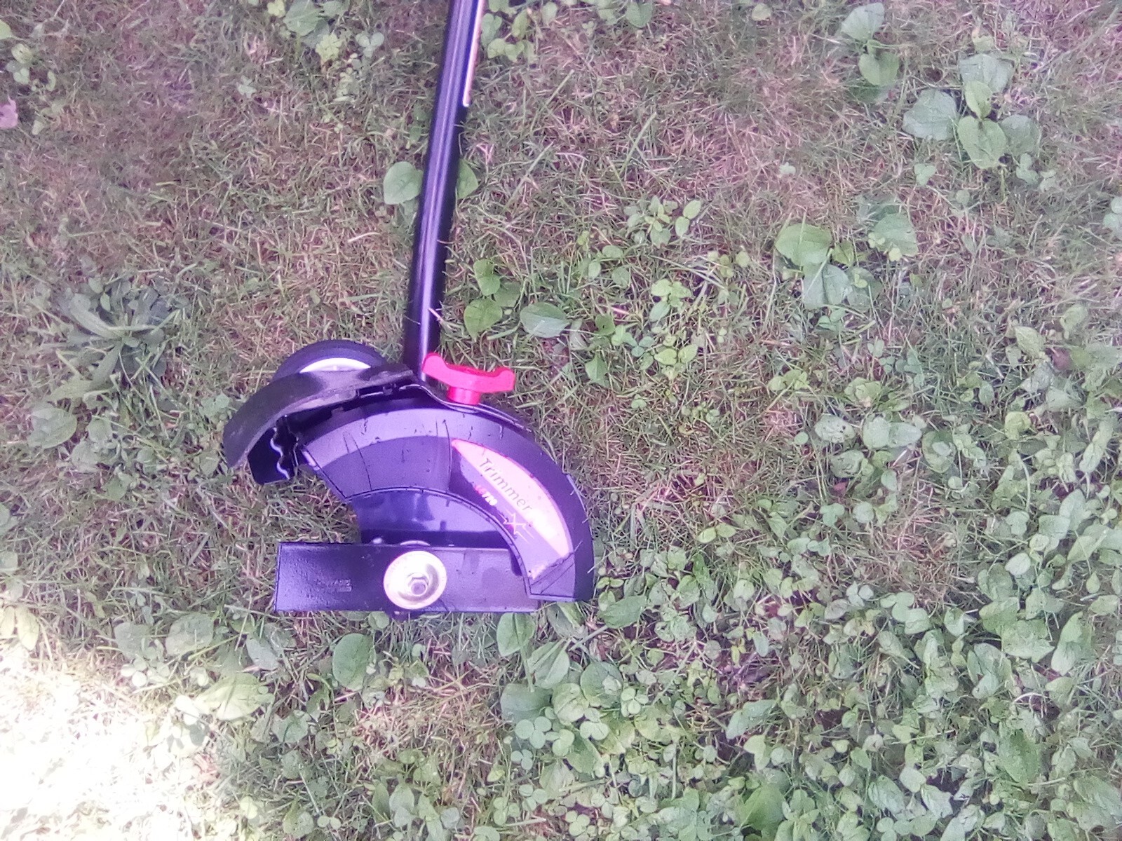 Trimmer plus lawn edger attachment 