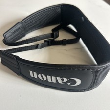 Genuine Canon padded neck strap for DSLR and mirrorless cameras.