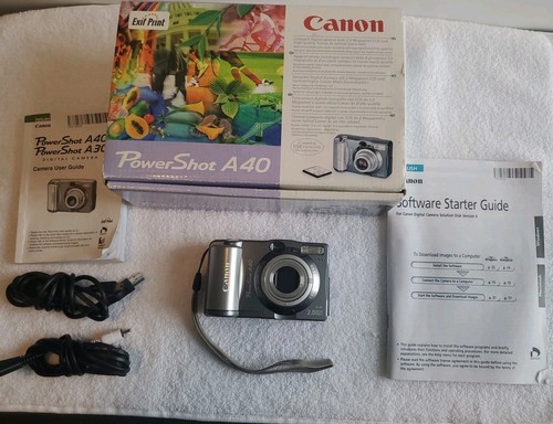 CANON PowerShot A40 with Strap 2 Megapixels digital camera w/manuals Parts Only - Picture 1 of 8
