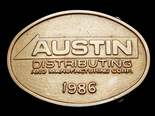 MG03102 VINTAGE 1986 **AUSTIN DISTRIBUTING & MANUFACTURING CORP.** BELT BUCKLE