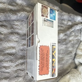 Atari Lynx Console with Carrying Case and 7 Game Cartridges