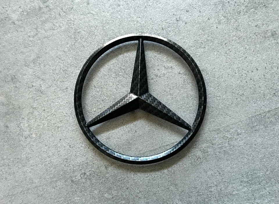 Mercedes-Benz GL550 ML350 mate fibra de carbono puerta levadiza trasera emblema OEM maletero estrella Foto 2 de 4