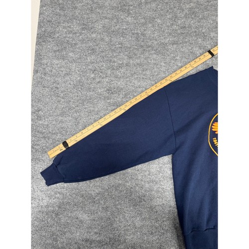 Yellow-labeled VTG Jerzees sweatshirt large, navy blue with white eagle graphic and “USA Made” text on sleeve.
