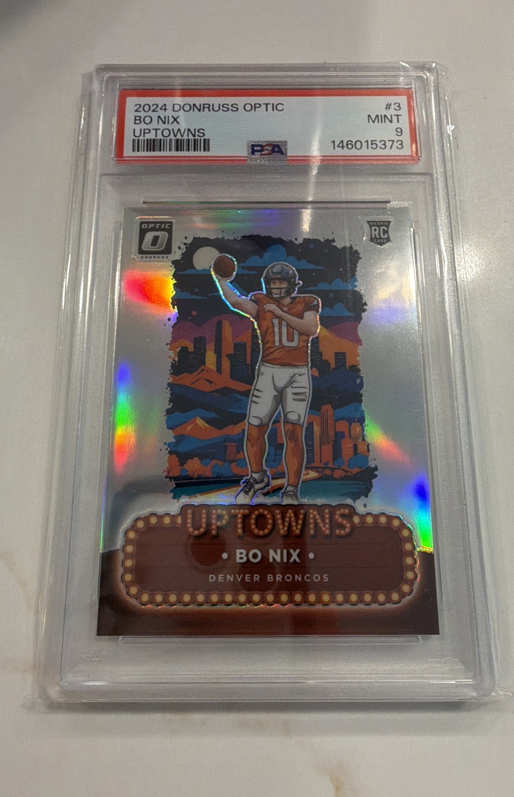 Bo Nix #3 (Football Cards 2024 Panini Donruss Optic Uptowns) — is it worth grading?