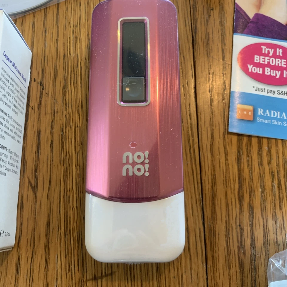 Sistema de depilación sin vello rosa con estuche/accesorios Hair Pro 3 enchufables/caja abierta Foto 2 de 4