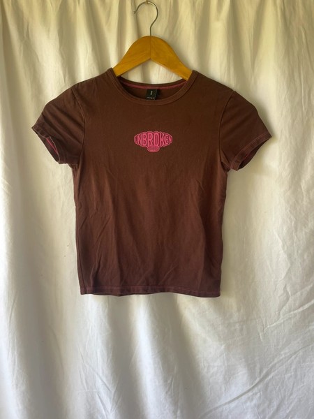Chocolate brown with contrast fuchsia graphic print and stitching baby tee size