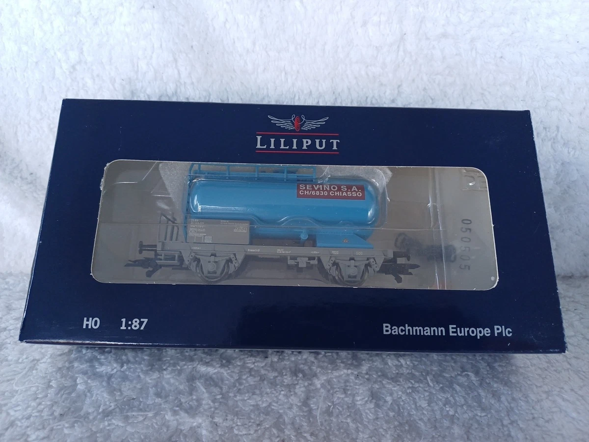 A collection of Liliput by Bachmann gauge HOe coaches and goods rolling