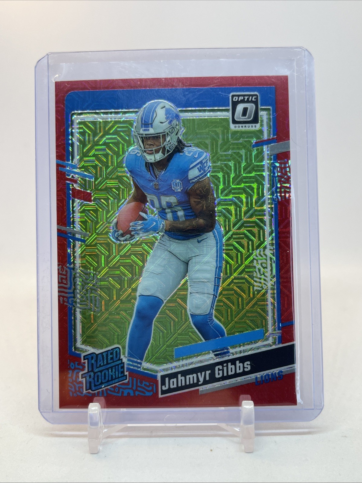 2023 Panini Donruss Optic - Rated Rookie Jahmyr Gibbs #236 Red Mojo Prizm (RC)