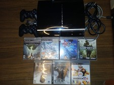 Sony PS3 Black Console W/ 7 games. Tested and working