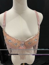 Pink sequin corset top with fringe and rhinestones. Size: 42